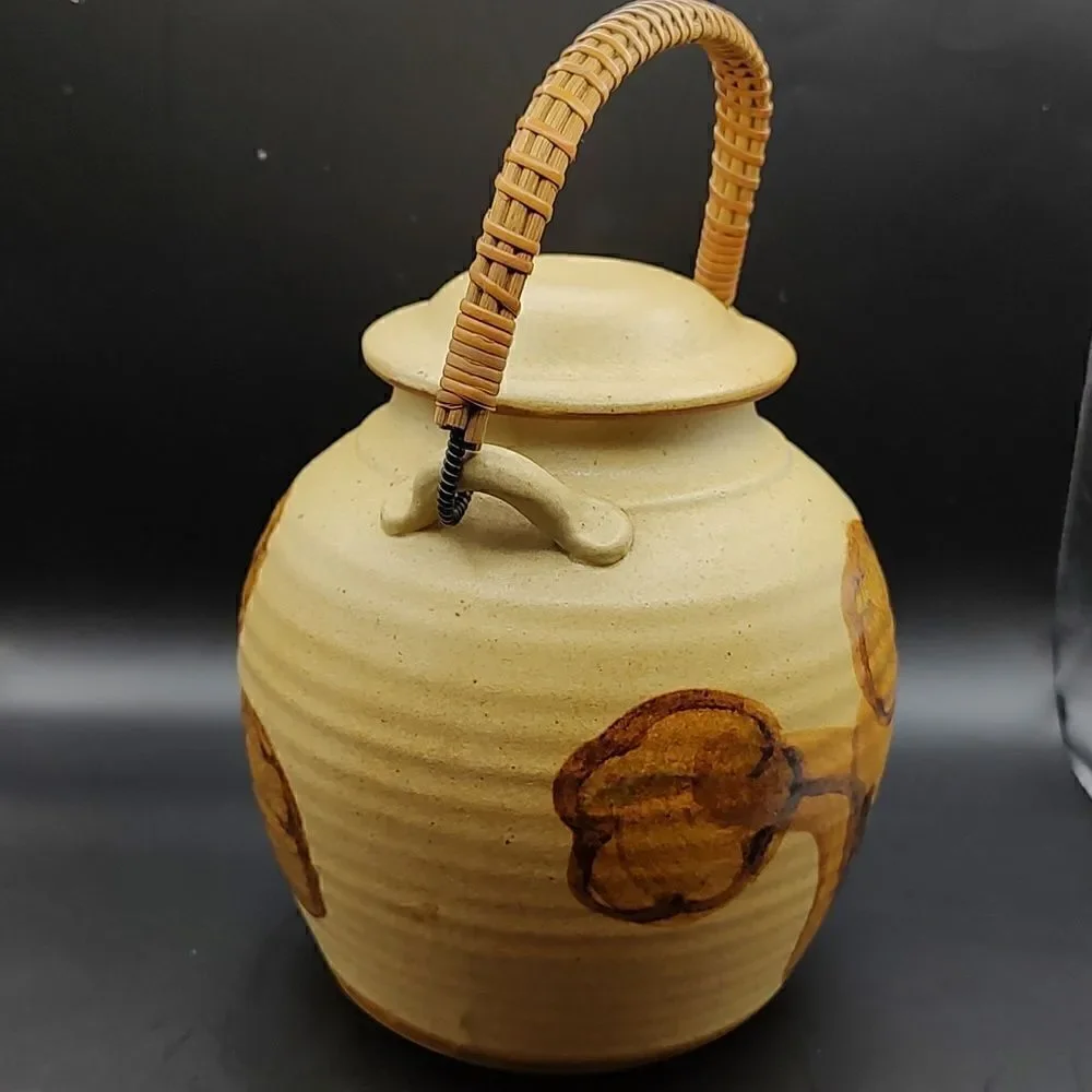 Vintage MCM California Art Pottery Teapot with a Woven Wicker Handle